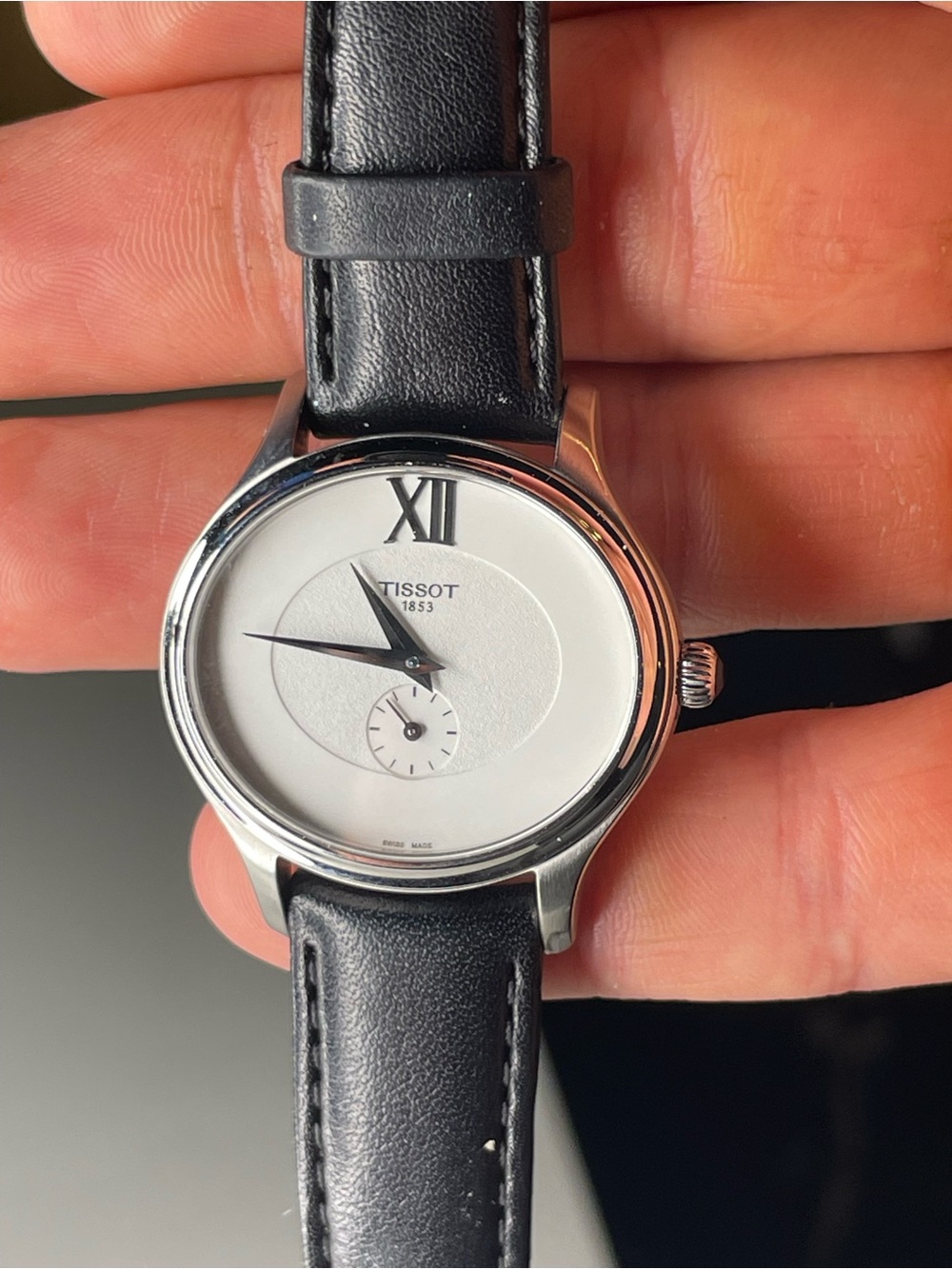 Tissot Bella Ora Ladies Black Leather Strap Silver Case White Dial Watch
